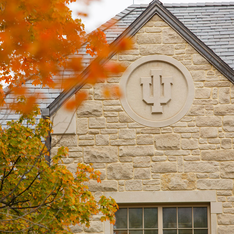 The IU logo on an exterior wall of the Hutton Honors College building