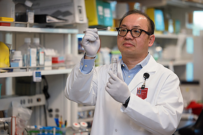 Chia-Ying “James” Lin, the first executive director of the Convergent Bioscience and Technology Institute at Indiana University Indianapolis poses for a photograph in a lab at 16 Tech.